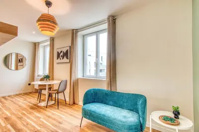 Coin salon dans l'établissement Le Cèdre Bleu - Bel appart climatisé quartier point du jour Lyon 5