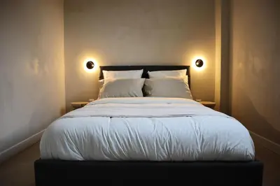 Un ou plusieurs lits dans un hébergement de l'établissement NOVA House T2