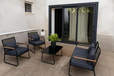 Coin salon dans l'établissement Evasion, vue jardin, Terrasse, WIFI haut-débit, RDC