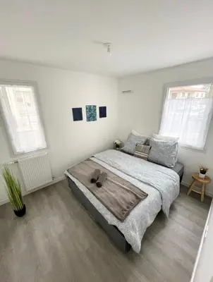 Un ou plusieurs lits dans un hébergement de l'établissement Appartement - Le Salengro