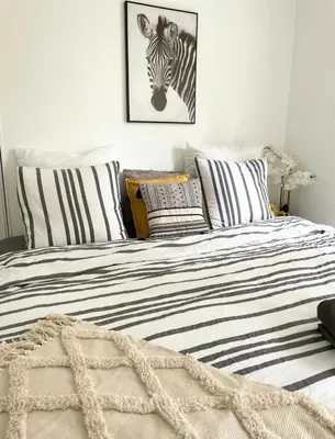Un ou plusieurs lits dans un hébergement de l'établissement Appartement - Le Salengro