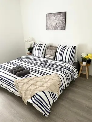 Un ou plusieurs lits dans un hébergement de l'établissement Appartement - Le Salengro