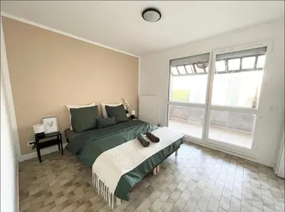 Un ou plusieurs lits dans un hébergement de l'établissement Apartment - Le Melies