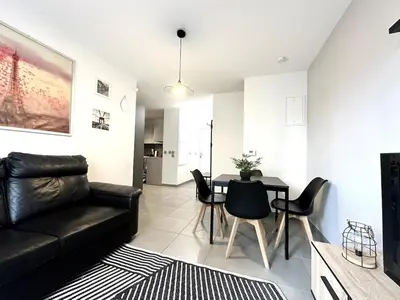 Coin salon dans l'établissement T3 calme & lumineux - idéal familles & pros à Villeurbanne