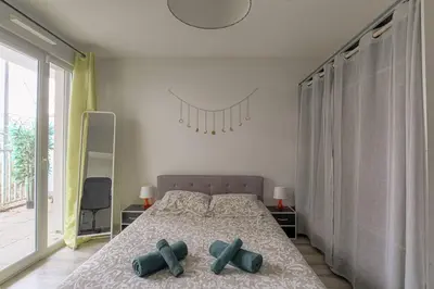 Un ou plusieurs lits dans un hébergement de l'établissement T3 calme & lumineux - idéal familles & pros à Villeurbanne