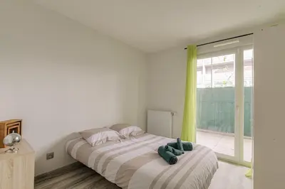 Un ou plusieurs lits dans un hébergement de l'établissement T3 calme & lumineux - idéal familles & pros à Villeurbanne