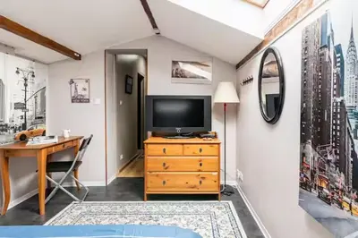Télévision ou salle de divertissement dans l'établissement Chatillon