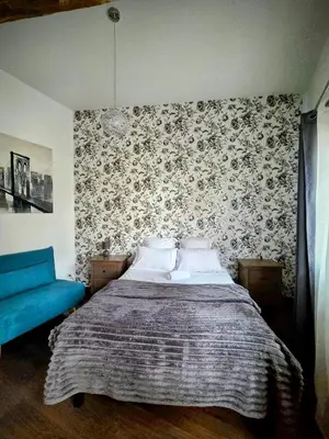 Un ou plusieurs lits dans un hébergement de l'établissement Le Clos des Roses - Chambre d'hôtes
