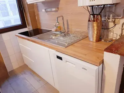 Cuisine ou kitchenette dans l'établissement Lyon Centre Warm apartment full of charm