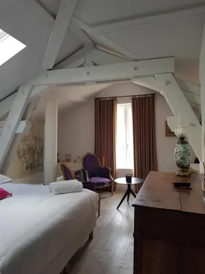 Un ou plusieurs lits dans un hébergement de l'établissement Lyon 4e Croix Rousse Maison complète Jardin