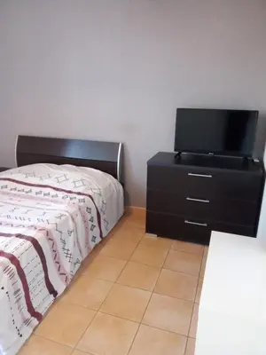 Télévision ou salle de divertissement dans l'établissement Chez Steph