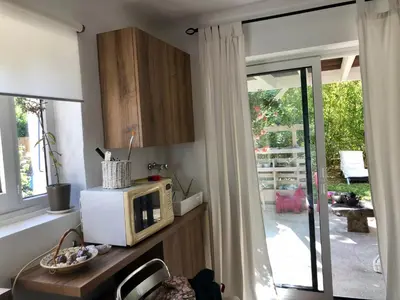 Cuisine ou kitchenette dans l'établissement Studio calme avec terrasse proche de Lyon
