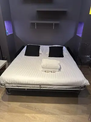 Un ou plusieurs lits dans un hébergement de l'établissement La Cachette St Jean, Calme et Sérénité Vieux Lyon
