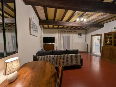 Coin salon dans l'établissement La dépendance de la Ferme Blanche