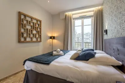 Un ou plusieurs lits dans un hébergement de l'établissement Smartstay Chill republique - Villeurbanne