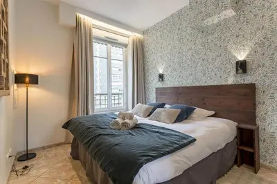 Un ou plusieurs lits dans un hébergement de l'établissement Smartstay Chill republique - Villeurbanne