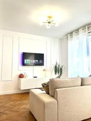 Télévision ou salle de divertissement dans l'établissement Lyon Suite Cosy - Appartement T2 - Proche Parc Tête d'Or
