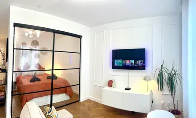 Télévision ou salle de divertissement dans l'établissement Lyon Suite Cosy - Appartement T2 - Proche Parc Tête d'Or
