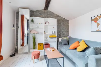 Coin salon dans l'établissement Le Studio Ivry - Lyon Croix Rousse