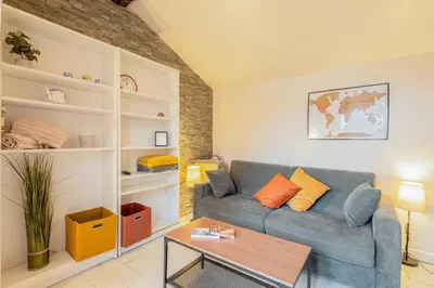 Coin salon dans l'établissement Le Studio Ivry - Lyon Croix Rousse