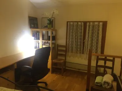 Un ou plusieurs lits dans un hébergement de l'établissement Ecully logement privé attenant de la maison principale