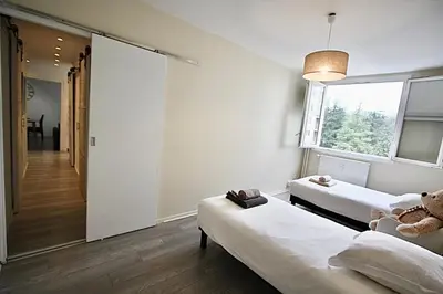Un ou plusieurs lits dans un hébergement de l'établissement Pied-à-terre - Apartment 75m2 - free parking