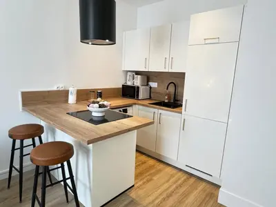 Cuisine ou kitchenette dans l'établissement Cosy & Design
