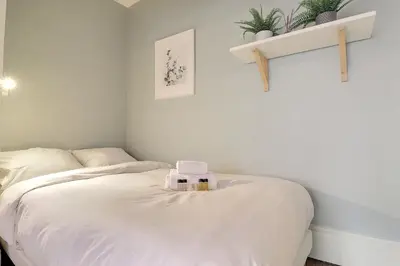 Un ou plusieurs lits dans un hébergement de l'établissement Modern and Cozy Studio in the Heart of Perrache Lyon