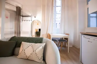 Coin salon dans l'établissement Le St Jean - 26m2 Vieux Lyon