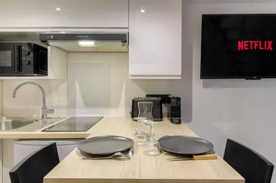 Cuisine ou kitchenette dans l'établissement City-duplex