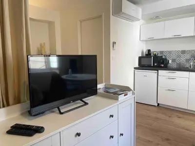 Cuisine ou kitchenette dans l'établissement Le Minimaliste, Appartement Hyper Centre Climatisé