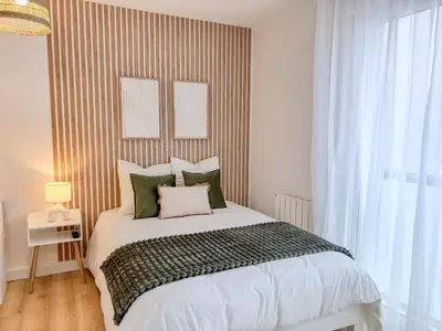 Un ou plusieurs lits dans un hébergement de l'établissement Studio Cosy idéalement situé