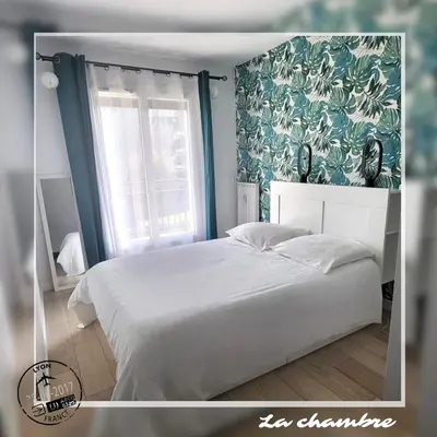 Un ou plusieurs lits dans un hébergement de l'établissement Appartement Tassin Centre - 15' de Lyon - 1 Parking
