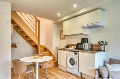 Cuisine ou kitchenette dans l'établissement L’Epicéa - RDJ duplex proche métrohôpital
