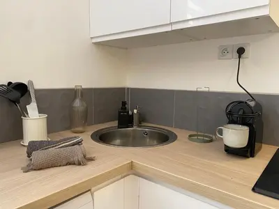 Cuisine ou kitchenette dans l'établissement Le Suchet