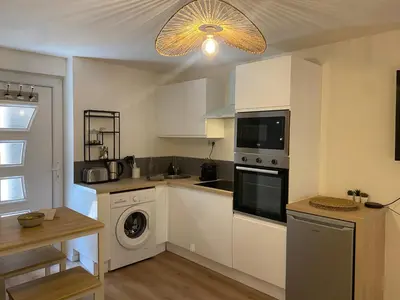 Cuisine ou kitchenette dans l'établissement Le Suchet