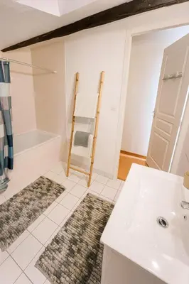 Un ou plusieurs lits dans un hébergement de l'établissement L 'Écrin de Trévoux 3 Chambres confort