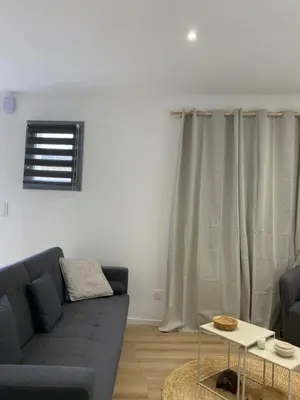 Coin salon dans l'établissement La Maisonnette de Curis