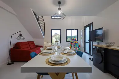 Télévision ou salle de divertissement dans l'établissement Mi Amore- Gîte 3 suites près de Lyon, parking free