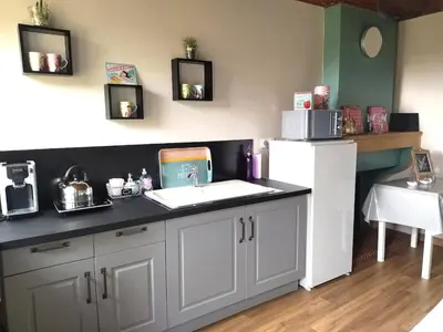 Cuisine ou kitchenette dans l'établissement Une evasion dans les Pierres Dorées