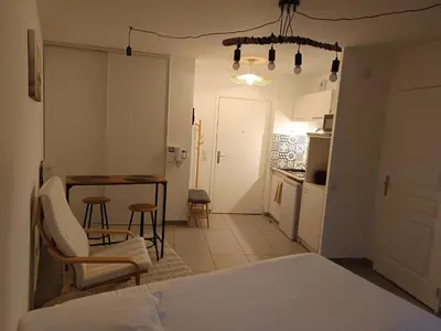 Un ou plusieurs lits dans un hébergement de l'établissement Studio Villa'vi