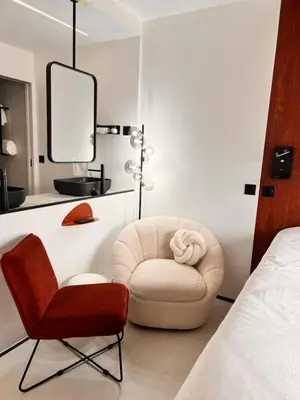 Un ou plusieurs lits dans un hébergement de l'établissement PAUL - Confortable studio - design et raffiné