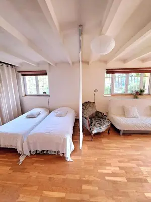Un ou plusieurs lits dans un hébergement de l'établissement Le Chantegrillet Grand Studio Quiet Garden