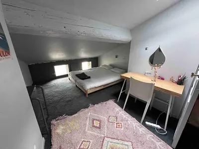 Un ou plusieurs lits dans un hébergement de l'établissement Le Prestige Vieux Lyon, Duplex Vue sur la Saône