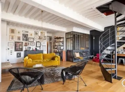 Coin salon dans l'établissement Le Prestige Vieux Lyon, Duplex Vue sur la Saône
