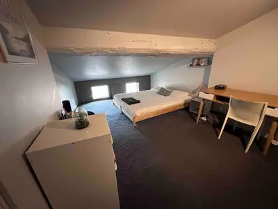 Un ou plusieurs lits dans un hébergement de l'établissement Le Prestige Vieux Lyon, Duplex Vue sur la Saône