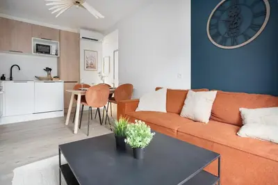 Cuisine ou kitchenette dans l'établissement L'Abri Citadin - Deux chambres
