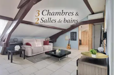 Coin salon dans l'établissement Appartement 3 chambres proche gare