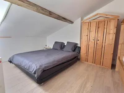Un ou plusieurs lits dans un hébergement de l'établissement Appartement 3 chambres proche gare