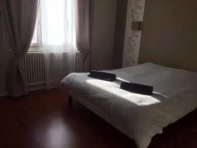 Un ou plusieurs lits dans un hébergement de l'établissement Le brin de soleil reposant